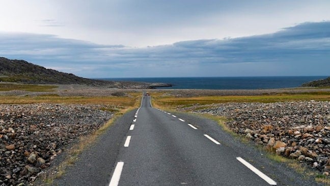 Norwegian Scenic Route Varanger is a drive in changing light on the way to the open sea.