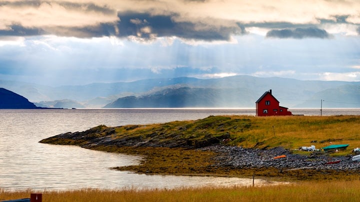The road out to Havøysund is fascinatingly varied. Parts of the road traverse a barren rocky landscape with the Arctic Ocean on one side and rugged outcrops on the other. 