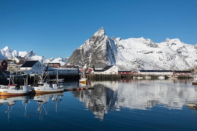 The Skagsanden beach with mountains in the background.