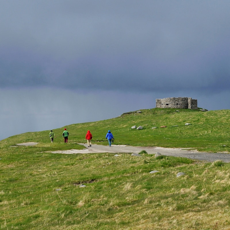 Wanderer auf dem Weg nach Borga.