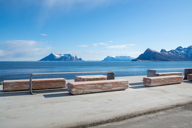 The Ureddplassen rest area with sea view, benches made of polished limestone marble.