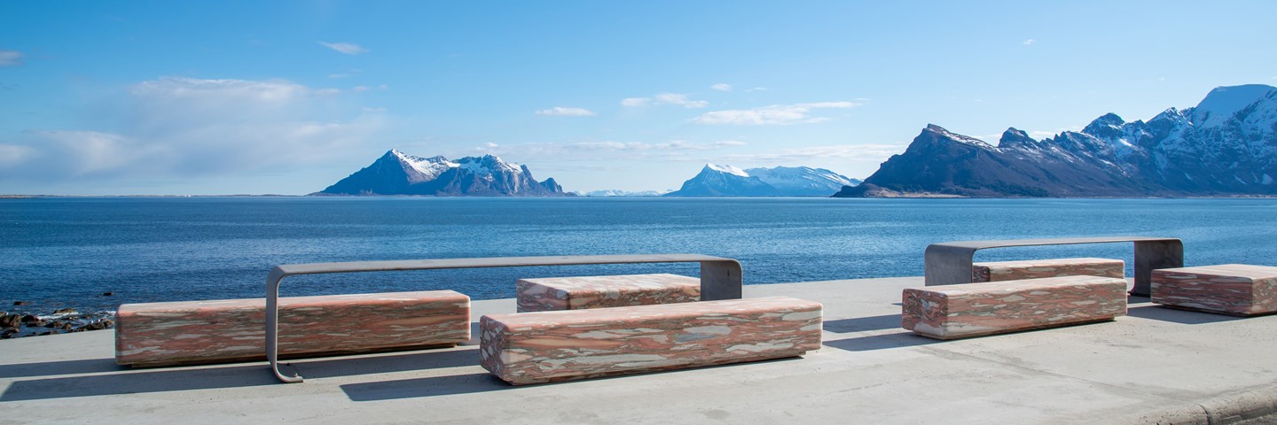 The Ureddplassen rest area with sea view, benches made of polished limestone marble.