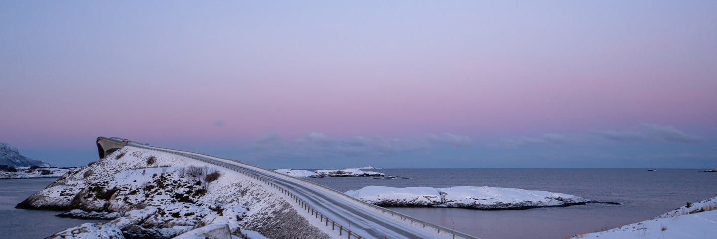 Pink winter lights at the Storseisund Bridge.